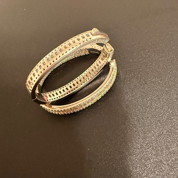 Elegant – These sparkling hoop earrings have a refined and sophisticated look. - Picture 5 of 14